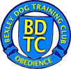 A wreath around a shield bearing 'BDTC' The wreath reads 'Bexley Dog Training Club' above and 'Obedience' below